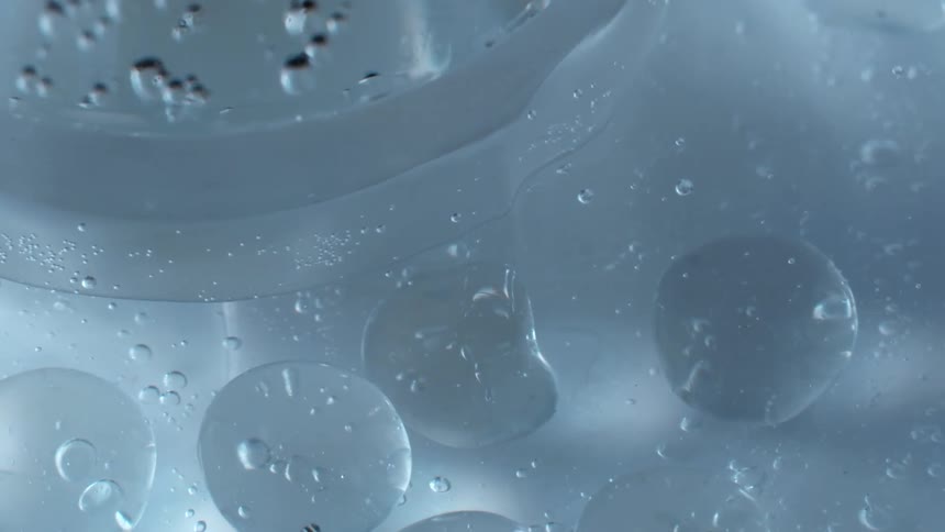Air bubbles floating under ice