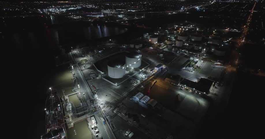 The city is brightly lit at night