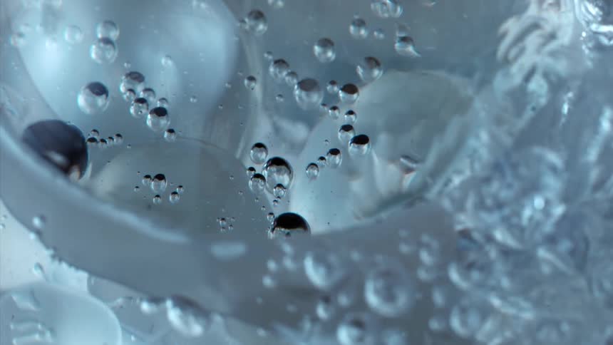 Bubbles in abstract moving liquid