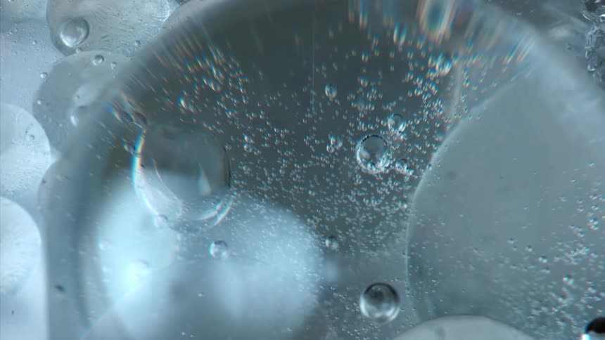 A surface with transparent liquid full of bubbles