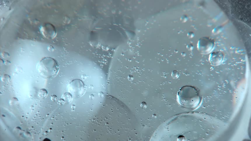 Air bubbles floating under ice
