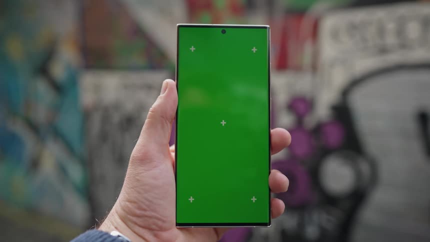 Human hand holding a smartphone