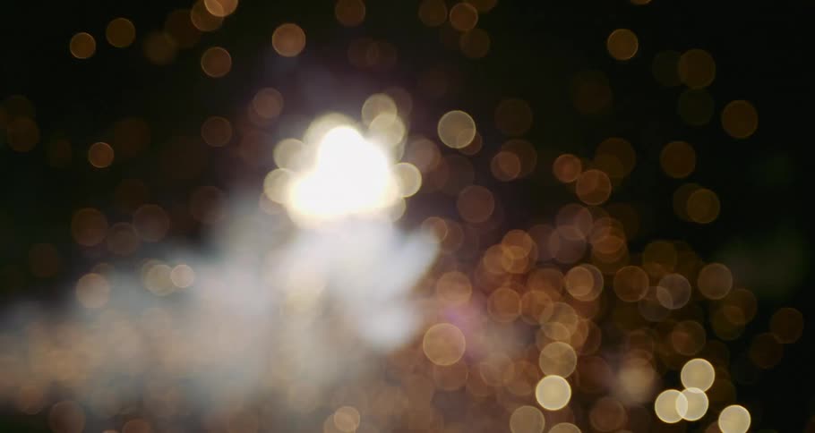 Close up of fireworks exploding in the night sky