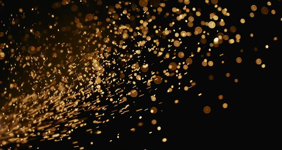 A dazzling fireworks display illuminates the night sky with bright and flashy bursts