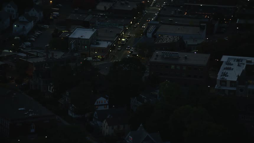 Aerial view of the streets of a small town at night