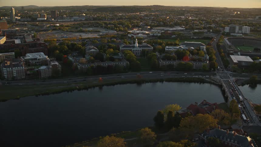 Aerial panorama of a suburb by the lakeside at sunrise