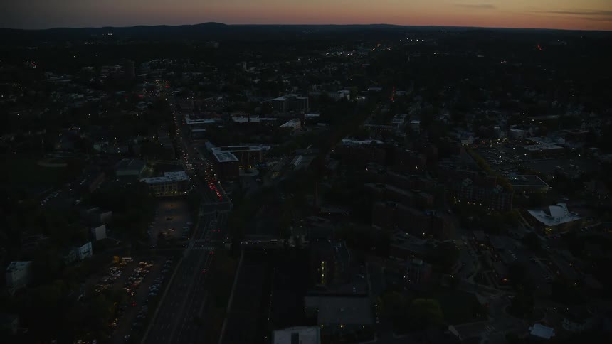 An aerial view of a very dark city at night