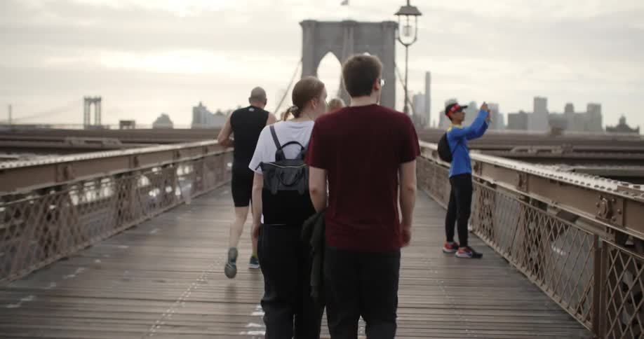 People are walking over the bridge