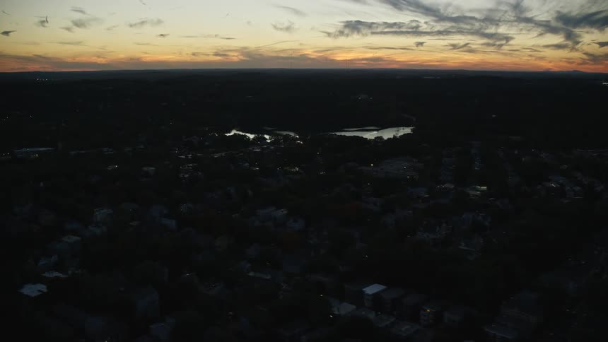 The sun is setting on the town