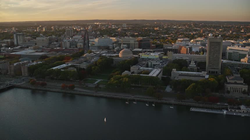 Aerial of urban city with port at dawn