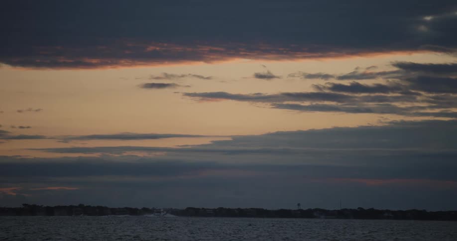 Panorama of the sea with the sunrise sky in slow motion