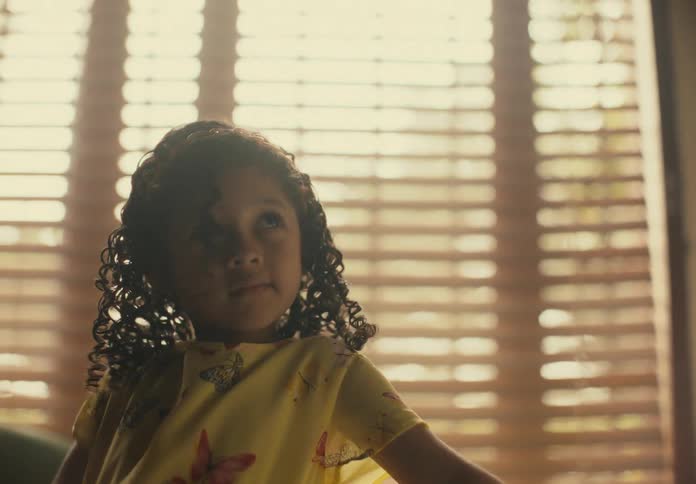 Portrait of a young girl in an indoor setting