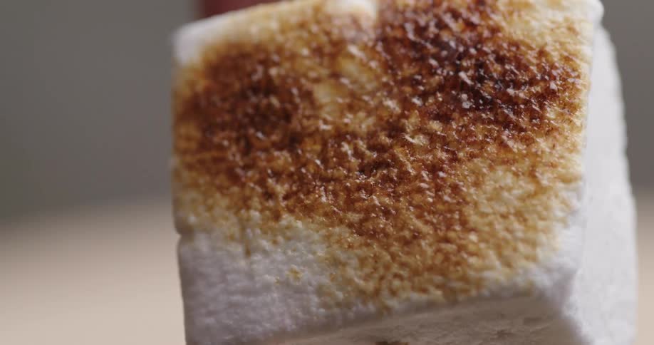 Extreme closeup of a marshmallow being roasted