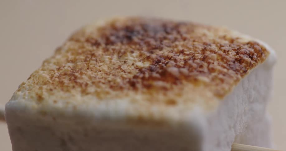 A marshmallow being roasted
