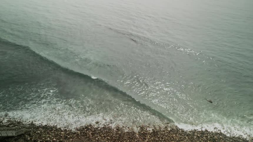 Small wave on a sea at midday