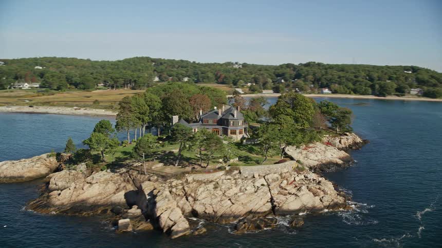 An aerial view of a rural community close to the sea