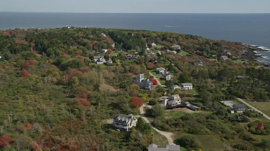 Aerial panorama of a peninsula with a small urban city