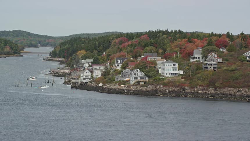 A residential area on top of a hill facing a bay