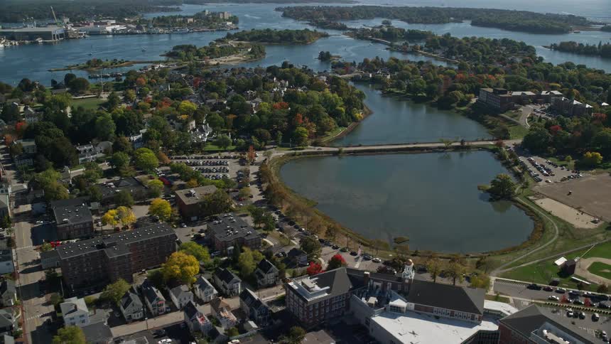 Aerial view of a lake in a small coastal city