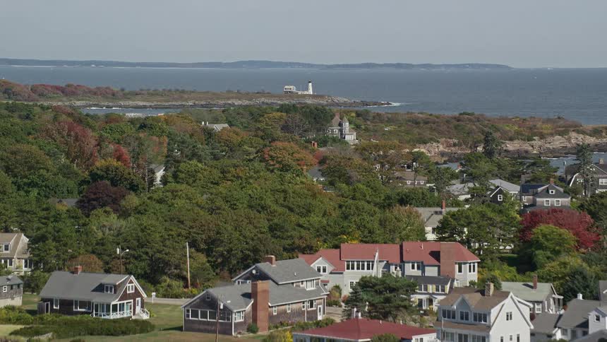 Aerial view of a small coastal town next to the ocean