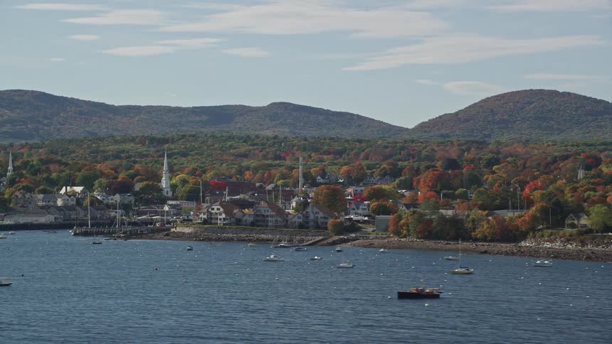 Boats are docked along the town shore