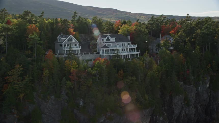 White residential houses on a hill at waterfront