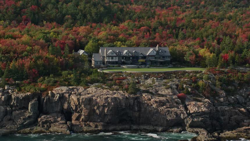 Mansion by the seaside in a forest