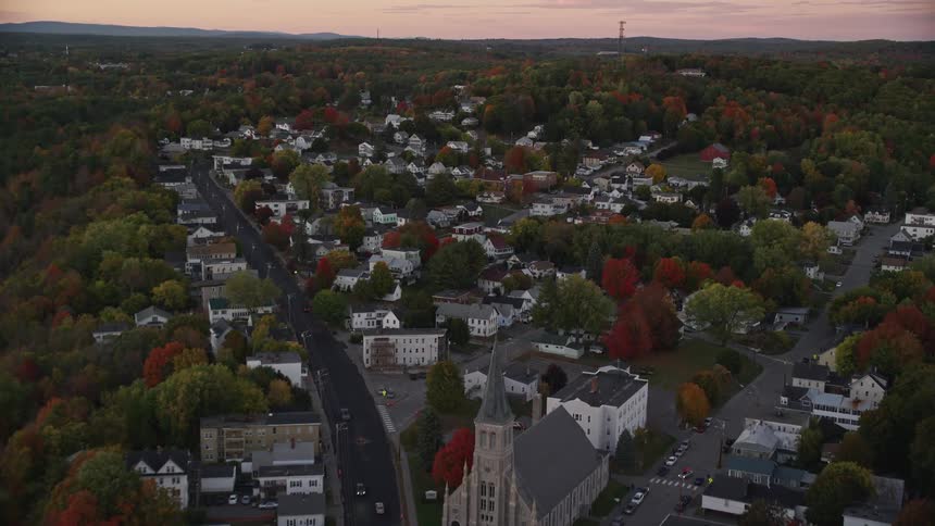 Aerial view of a small coastal town at evening