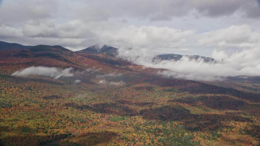 Mountain side in fall color on cloudy day