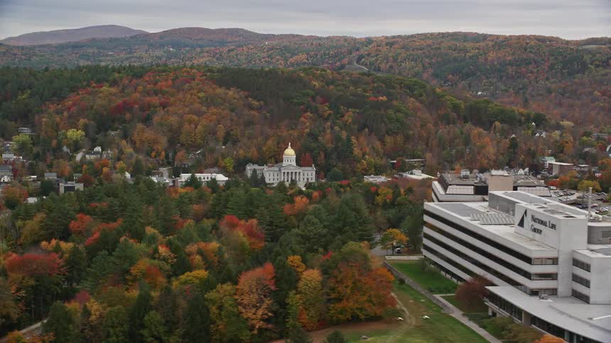 Aerial view of a capitol building on a rural city at evening