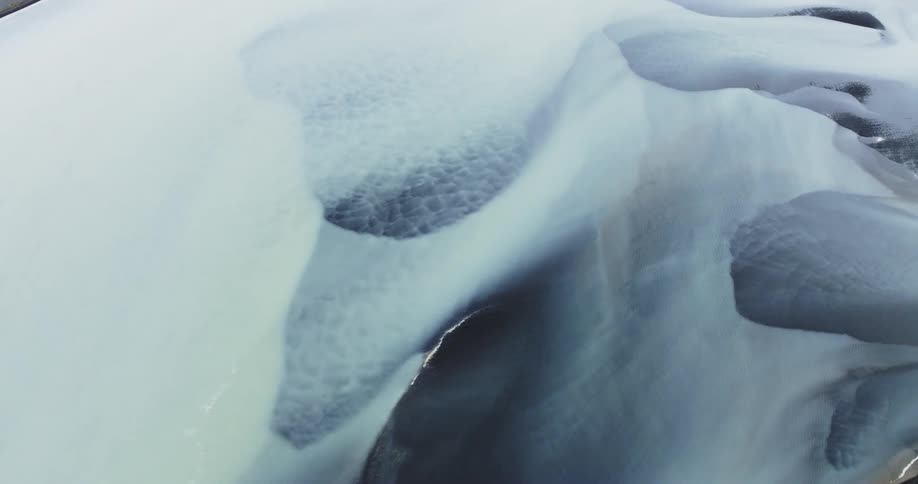 Gray and white glacier covers area