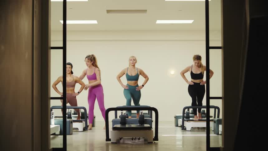 Women in a gym doing exercises