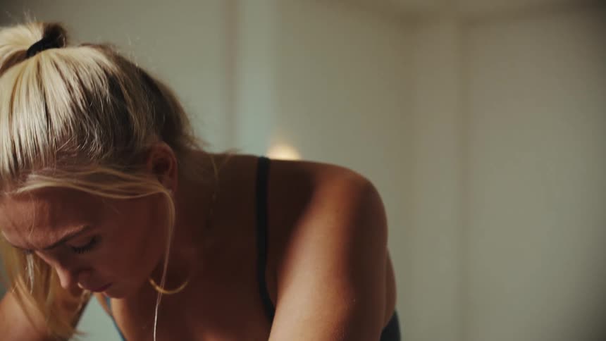 A woman is doing yoga for exercise