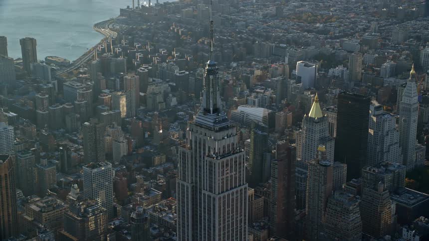 City skyline of empire state building in new york at midday