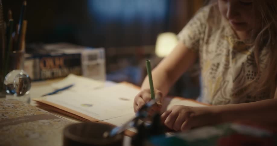 Girl sitting and drawing