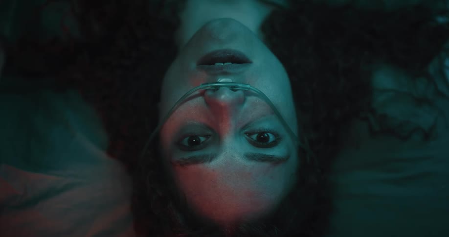 A woman with a nasal catheter sleeping