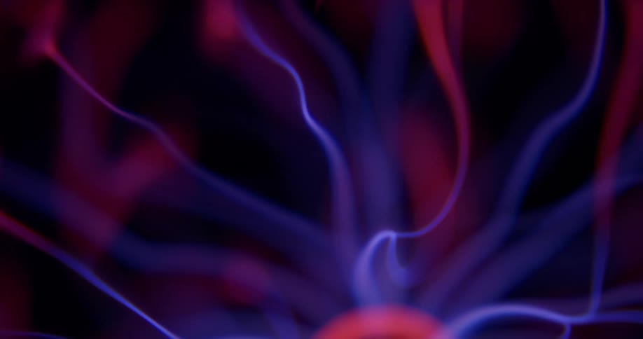 Glowing purple wisps extend and waver into pink illuminated energy from a phosphorescent pink orb