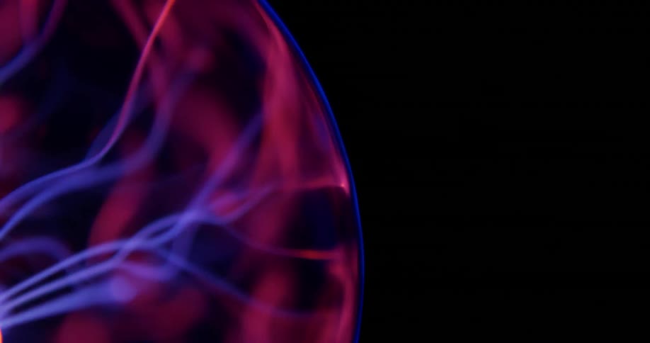Glowing purple wisps move inside an orb of pink electric energy