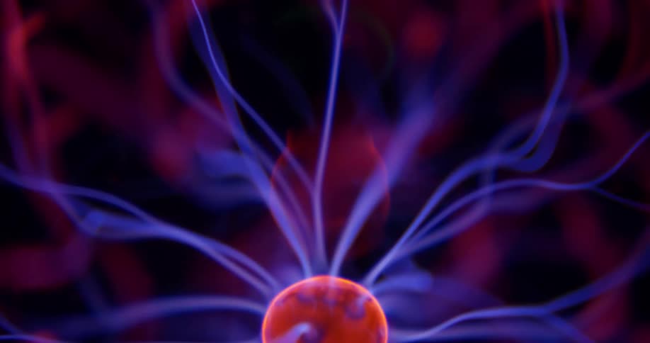 Lowing purple wisps extend into pink illuminated energy from a phosphorescent pink orb