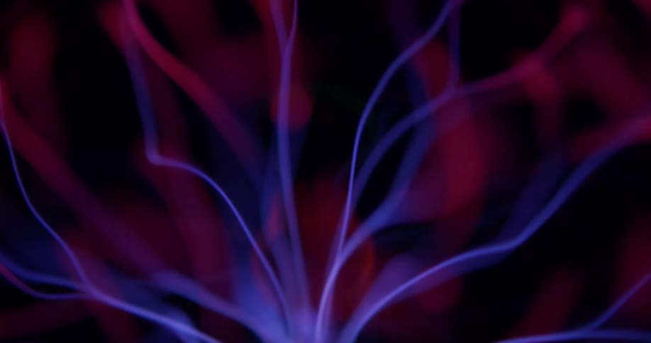 Glowing purple wisps extend into pink illuminated energy