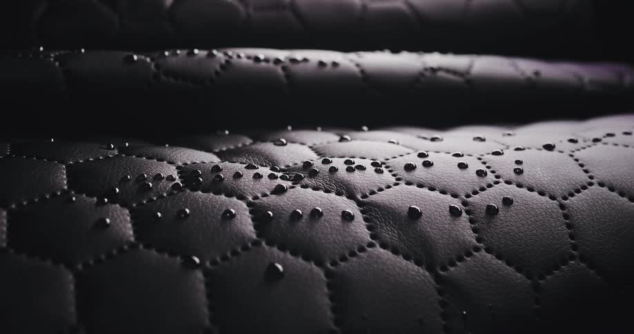 Beads of water are on the leather