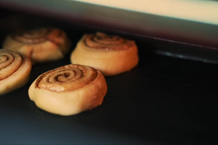 Sweet pastries baking in an oven