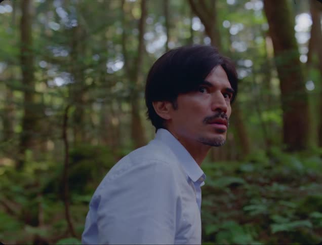 Man is startled while walking through forest
