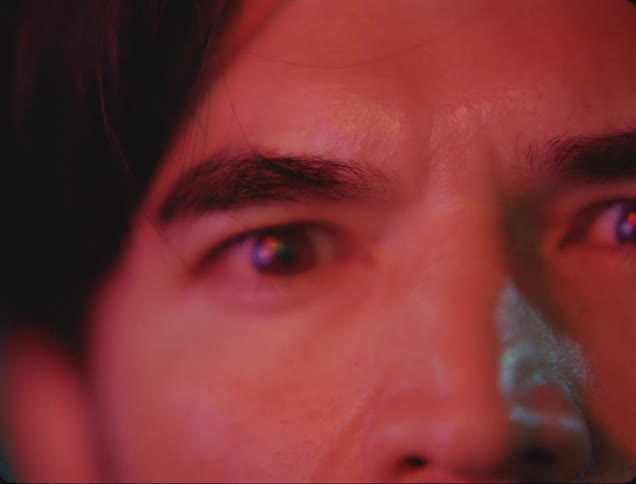 The mans pupils enlarge