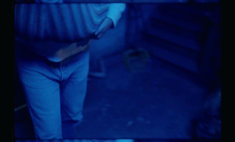 Man spins holding a woman with her legs wrapped around his chest