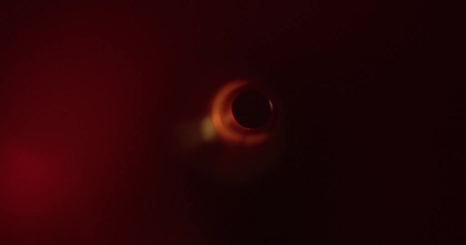 Internal view inside an abstract narrow tube with external reflections of lights and shadows