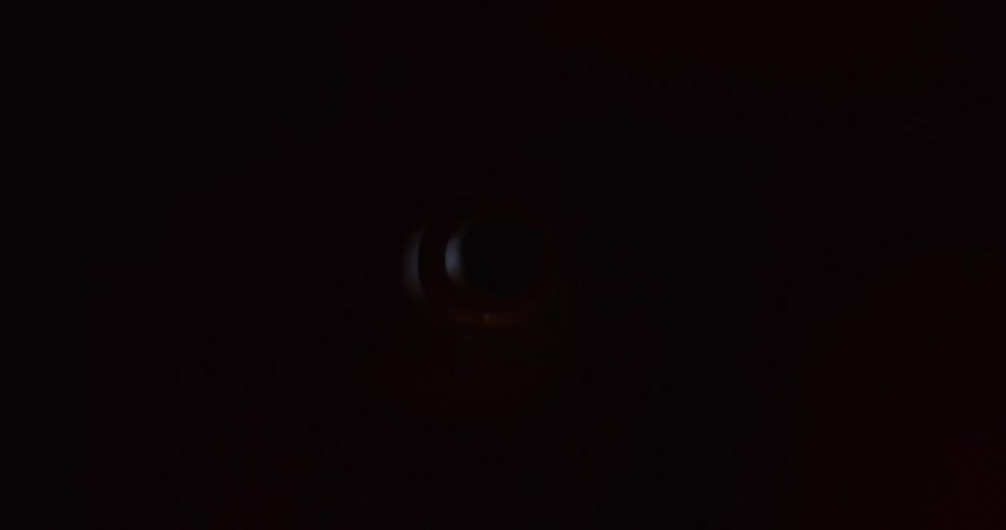 Rays of light and reflections passing around an abstract funnel