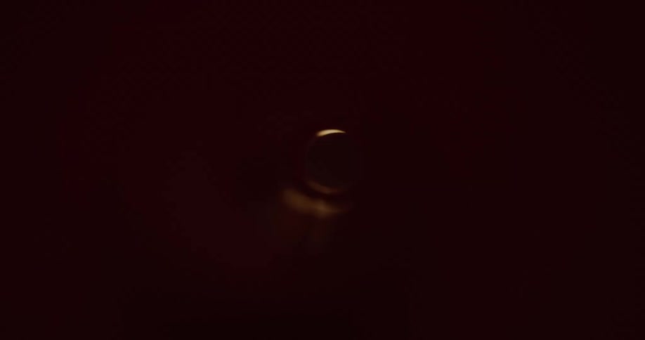 Internal view of an abstract tube with external lights generating shadows