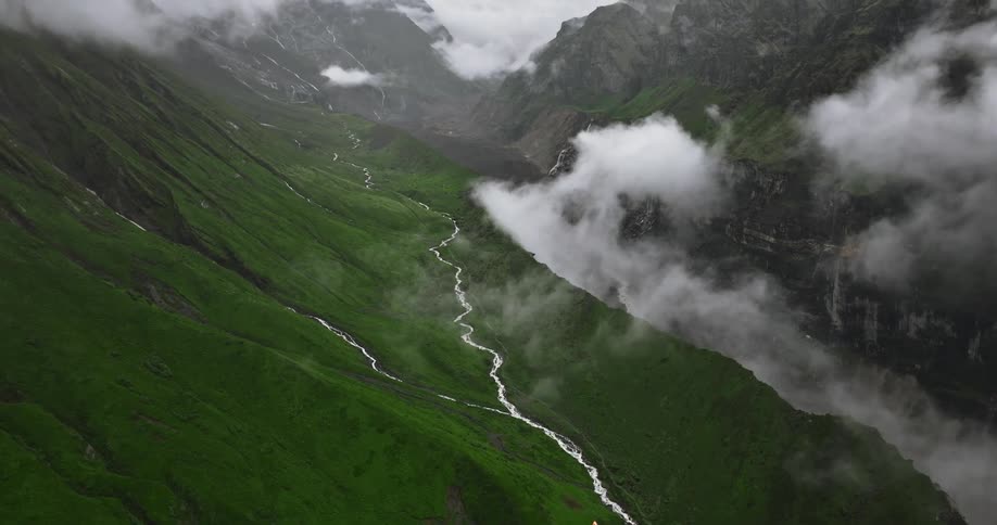 A small stream runs between the mountains