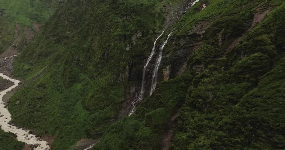 A stream on top the mountain creating a path